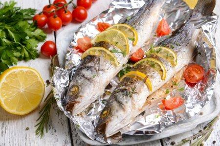 Fish baked in foil in the oven: 20 great recipes